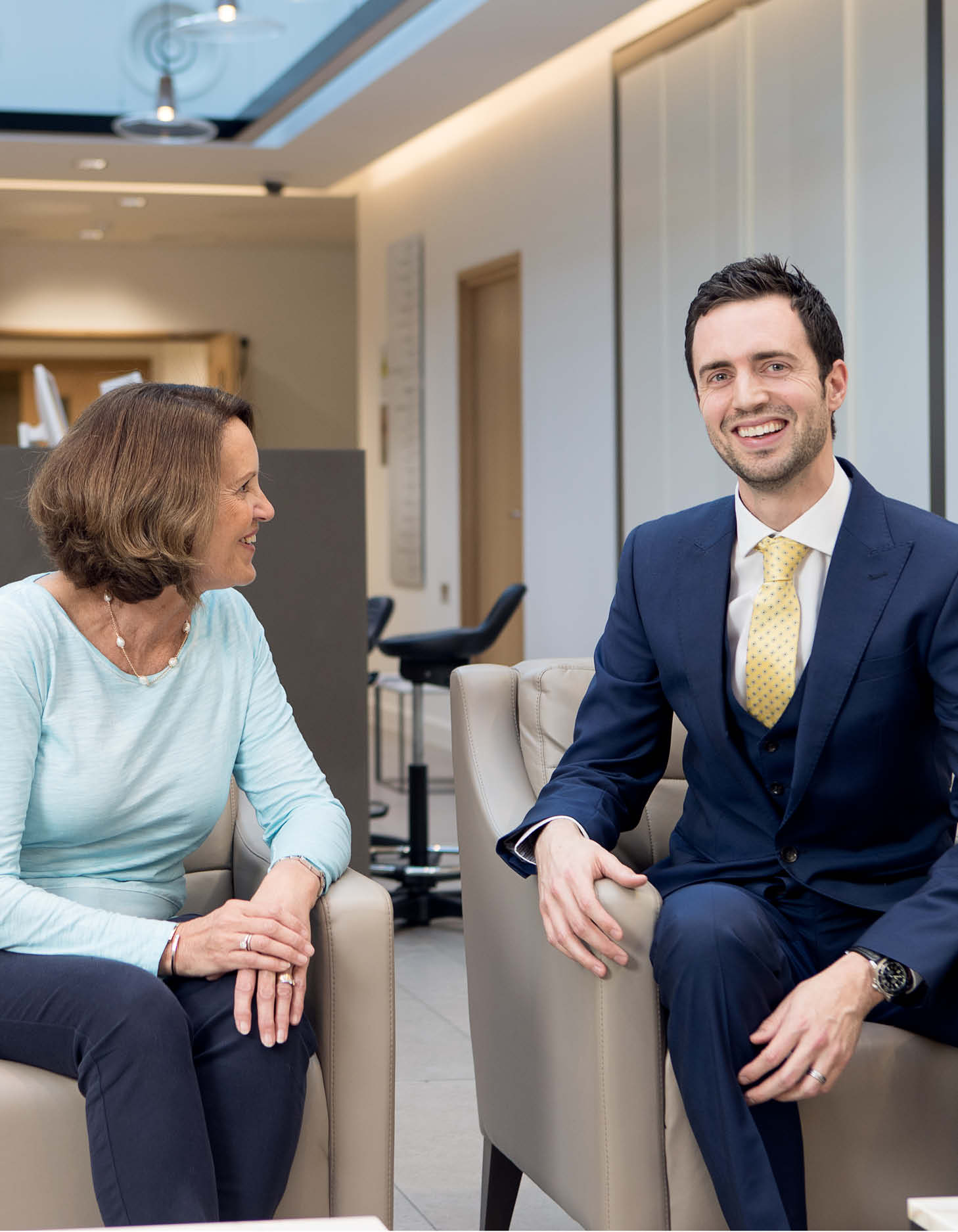 Audiologist Scott Drummond consulting with a patient